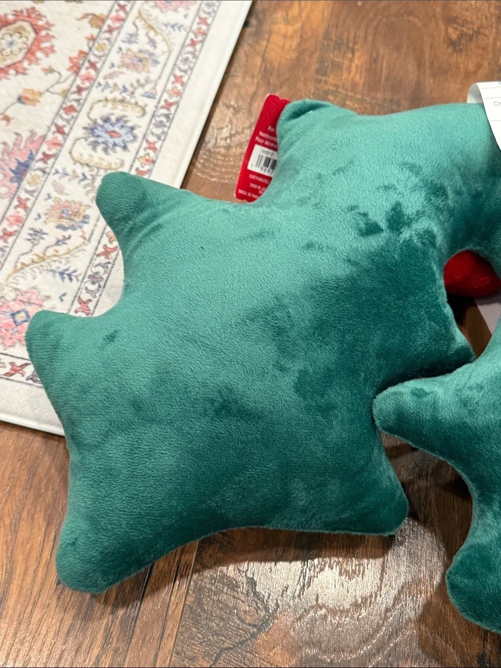 Green Holly Leaf Throw Pillow Pair with Red Pom Accents
